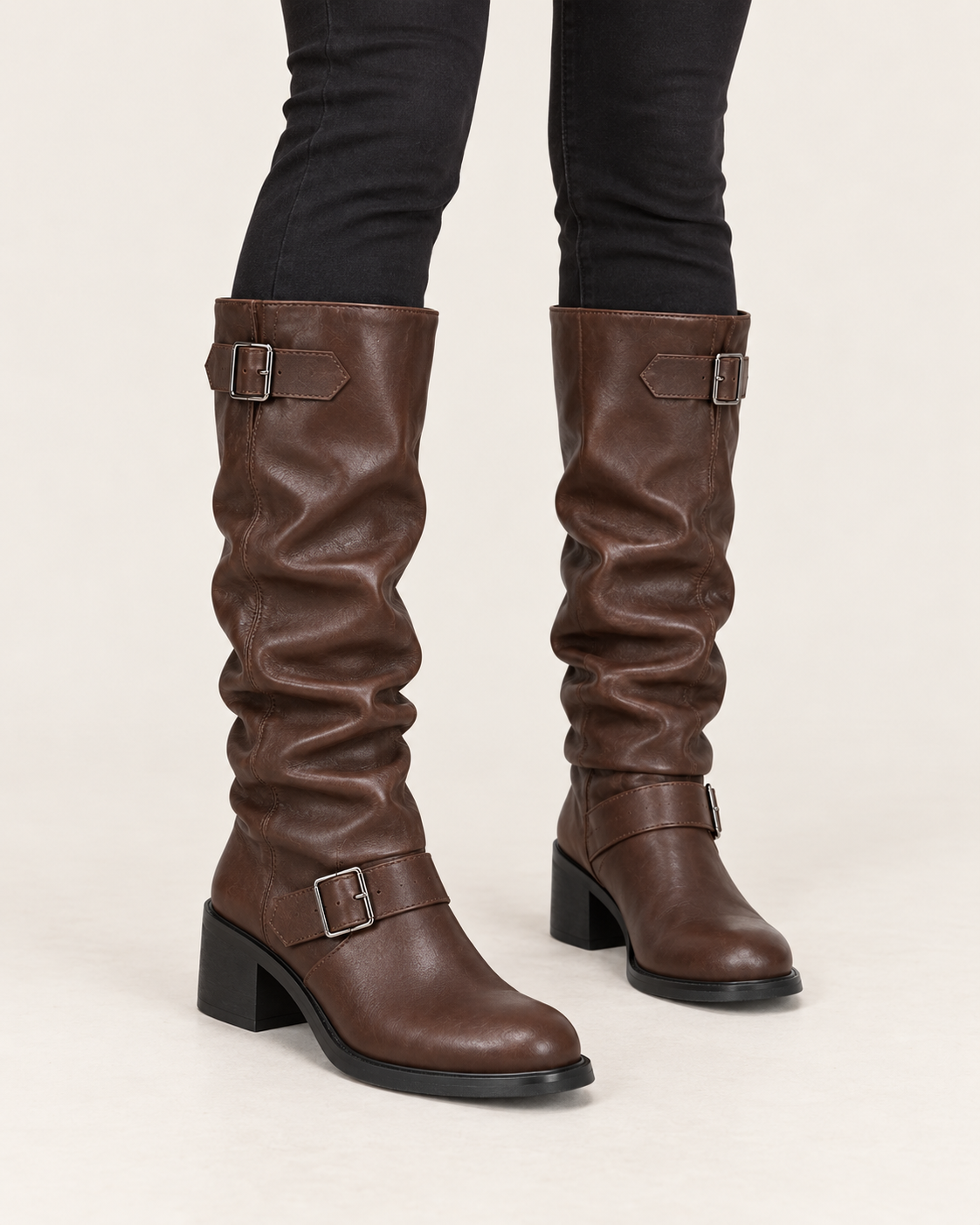 Women's Slouch Biker Boots with Buckle Straps and Block Heel in Brown, on model