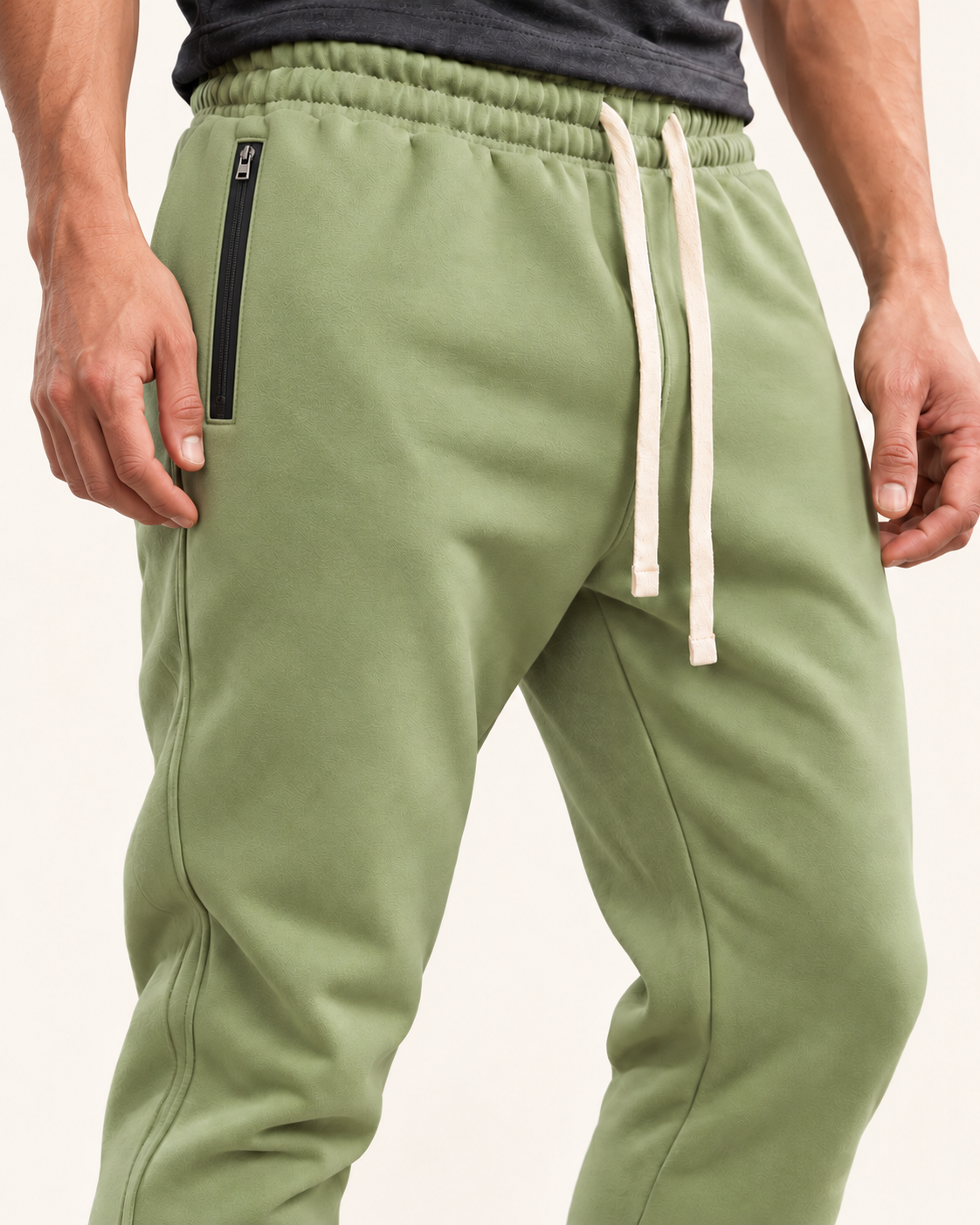 Men's Tapered Joggers With Zip Pockets in Sage Green, close up