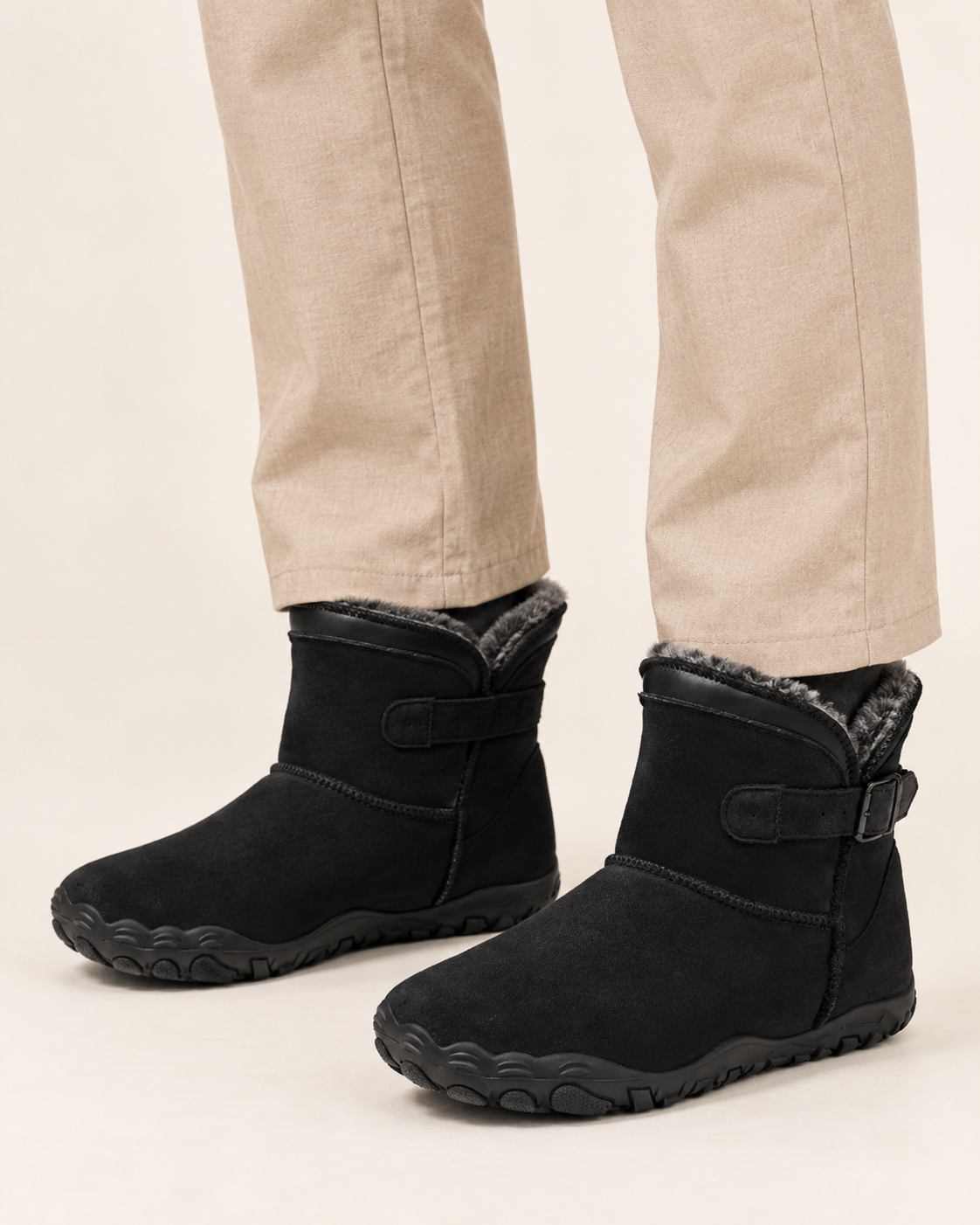 Unisex Fleece Lined Ankle Boots with Wide Toe Box and Buckle Strap in Black, on model