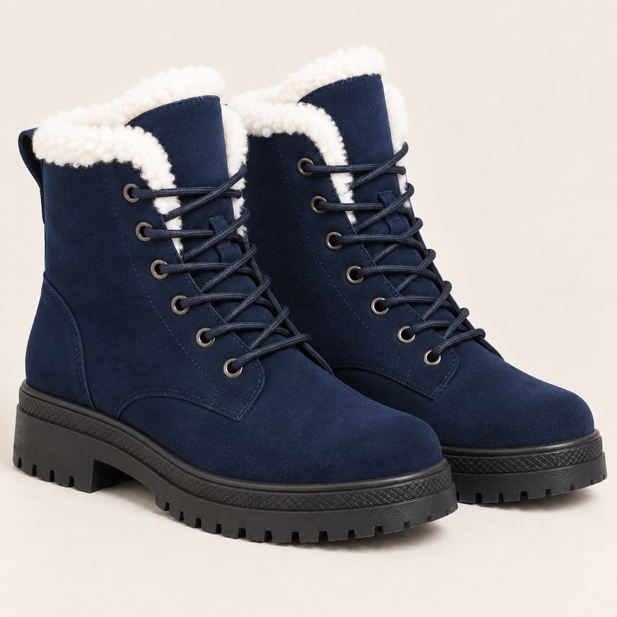 Women's Faux Fur Lined Lace Up Ankle Boots with Lug Sole in Navy, three quarter view