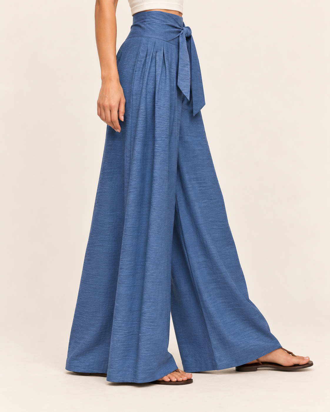 Women's High Waisted Wide Leg Trousers with Pleats and Tie Waist in Blue, side view